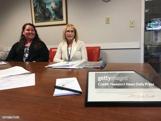 Kendall Perry, York-Poquoson Social Services' Family Services Supervisor, left, and social worker Stephanie Edwards talk about how a Virginia...