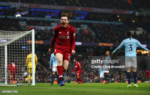 Andy Robertson of Liverpool celebrates his sides first goal during the Premier League match between Manchester City and Liverpool FC at the Etihad...