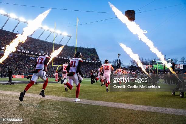 The Ottawa Redblacks come onto the field before the game against the Calgary Stampeders during the Grey Cup at Commonwealth Stadium on November 25,...