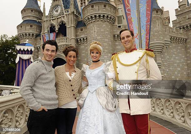 In this handout image provided by Disney, to celebrate their first wedding anniversary, Kevin Jonas of the pop trio "Jonas Brothers" and his wife...