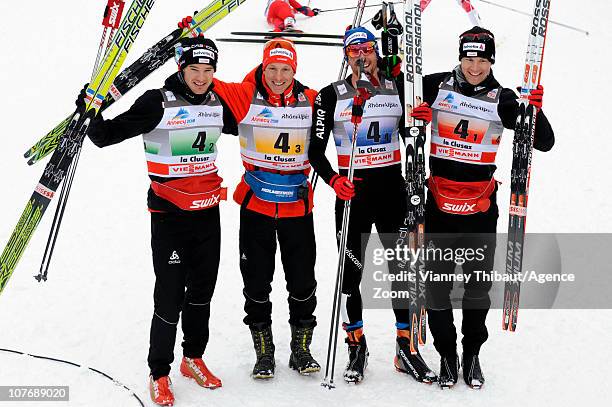 Toni Livers, Dario Cologna, Remo Fischer, Curdin Perl of Switzerland takes 1st place during the FIS Cross-Country World Cup Men's 4x10 km Relay on...