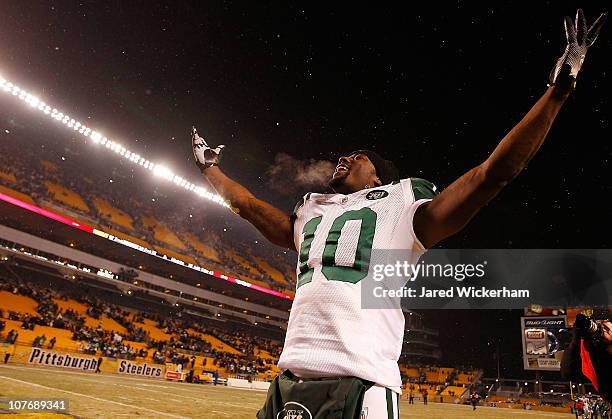Santonio Holmes of the New York Jets gestures to the crowd following their win against the Pittsburgh Steelers on December 19, 2010 at Heinz Field in...
