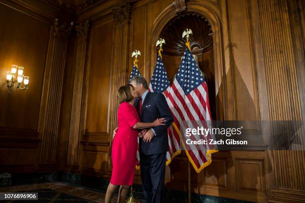 House Speaker Nancy Pelosi kisses her husband, Paul Pelosi, on Capitol Hill on January 3, 2019 in Washington, DC. Under the cloud of a partial...