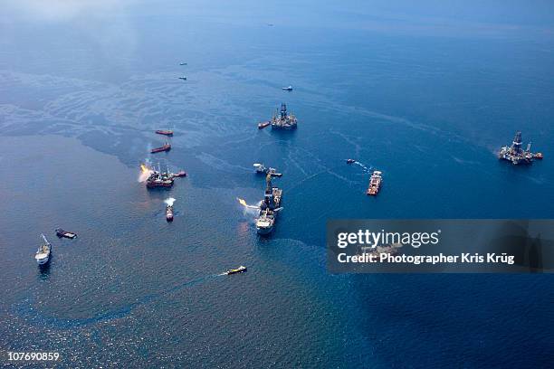 overhead of the deepwater horizon oil spill source - gulf of mexico aerial stock pictures, royalty-free photos & images