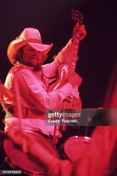 Singer-fiddler Charlie Daniels plays guitar with The Charlie Daniels Band at the Omni Coliseum on July 5, 1975 in Atlanta, Georgia.