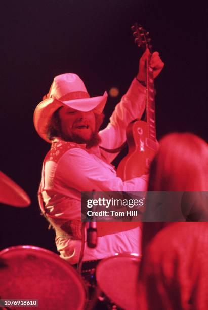 Singer-fiddler Charlie Daniels plays guitar with The Charlie Daniels Band at the Omni Coliseum on July 5, 1975 in Atlanta, Georgia.