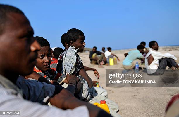 BAKANOEthiopian illegal immigrants from the Oromo region wait on December 5, 2010 near Obok, north of Djibouti's capital, for smugglers' boats to...