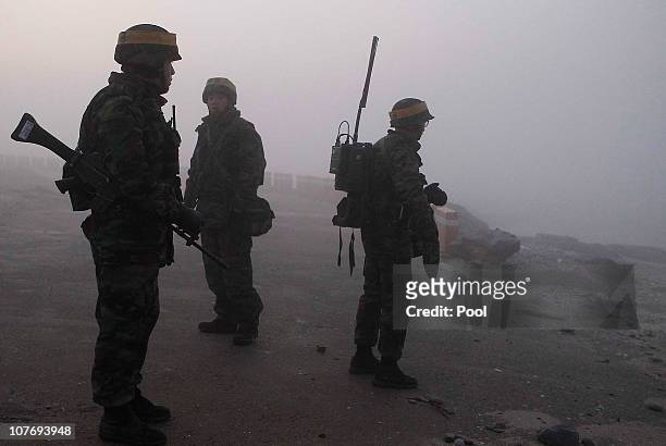 South Korean marines patrol on December 20, 2010 in Yeonpyeong Island, South Korea. South Korea held live-firing drills on the island of Yeonpyeong,...