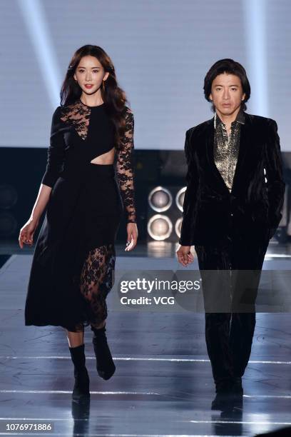 Japanese actor Takuya Kimura and Chinese actress Lin Chi-ling are seen onstage during the Asia Fashion Award 2018 at Chiang Kai-shek Memorial Hall on...