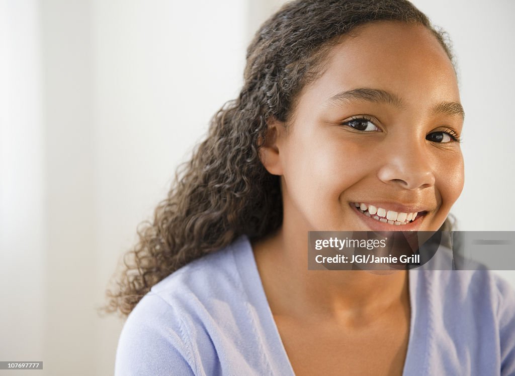 Smiling mixed race girl