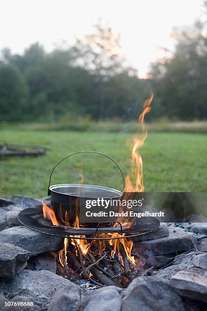 usa, pennsylvania, pot over campfire - campfire no people stock pictures, royalty-free photos & images