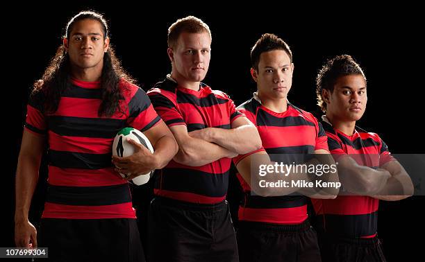 studio portrait of male rugby team - rugby portraits stock-fotos und bilder