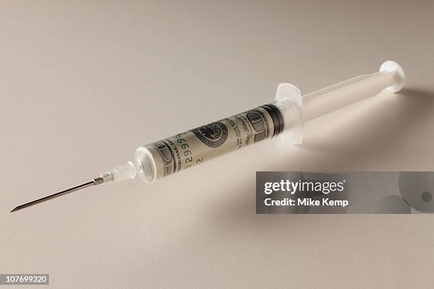 Monetary Injection Graph Money Injection Photos and Premium High Res Pictures - Getty Images