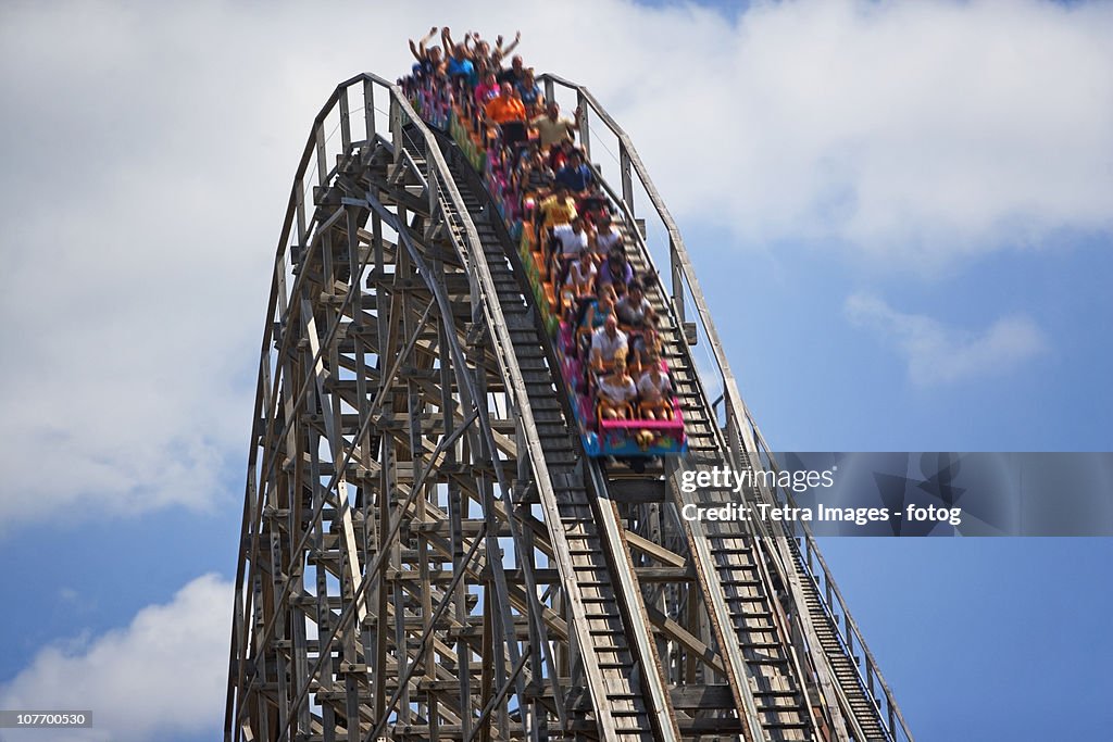 USA, New Jersey, Jackson, People on rollercoaster