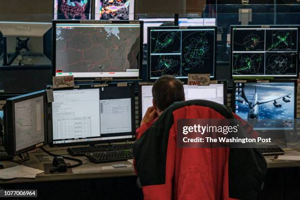 Traffic Management Specialists monitor airline traffic at the Air Traffic Control System Command Center on Friday, November 16, 2018 in Warrenton,...