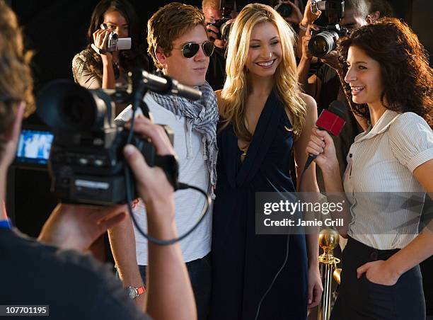 usa, new jersey, jersey city, journalist with celebrities at red carpet event - press & vip stock pictures, royalty-free photos & images