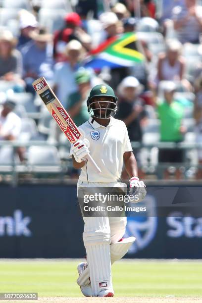 Temba Bavuma of South Africa raises his bat after reaching his fifty during day 2 of the 2nd Castle Lager Test match between South Africa and...