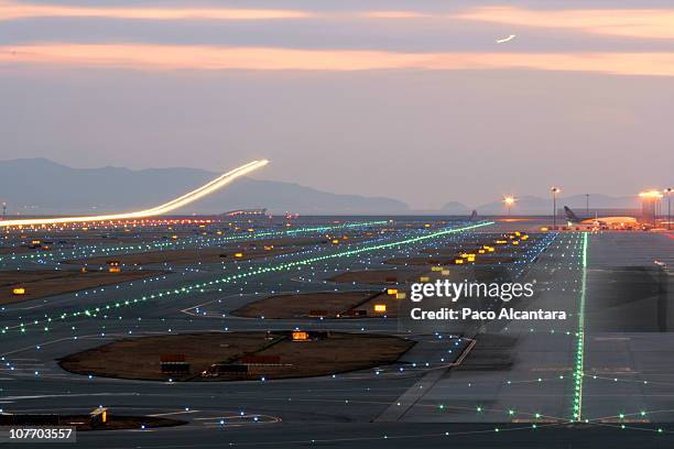 busy schedule - airport lights stock pictures, royalty-free photos & images