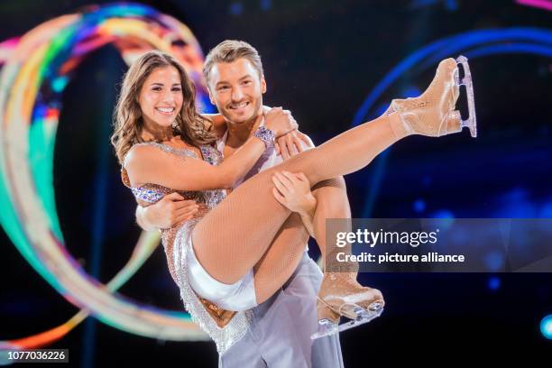 January 2019, North Rhine-Westphalia, Köln: Sarah Lombardi, singer, and Joti Polizoakis, ice dancer, are on the ice at a press event for the new...