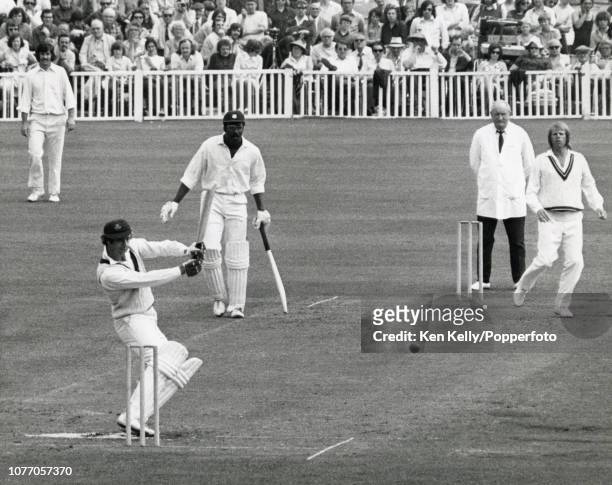 Lancashire batsman David Lloyd pulls the ball to the boundary off the bowling of Worcestershire's Ted Hemsley during the John Player League match...