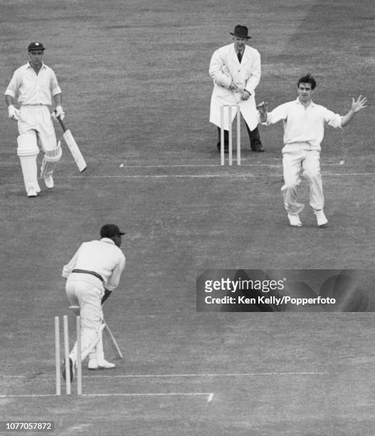 Everton Weekes of West Indies is bowled for 9 runs by Fred Trueman of England during the 1st Test match between England and West Indies at Edgbaston,...