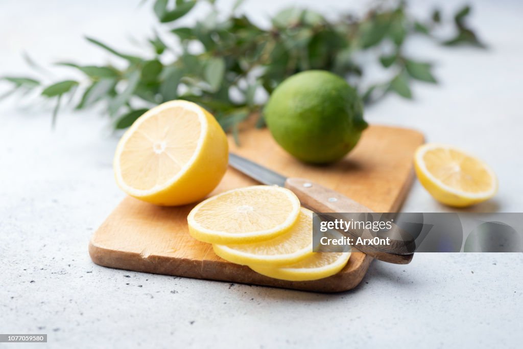 Citrus slices on wooden board
