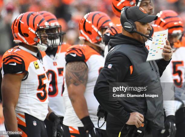 Head coach Marvin Lewis of the Cincinnati Bengals calls plays from the sideline in the fourth quarter of a game against the Cleveland Browns on...