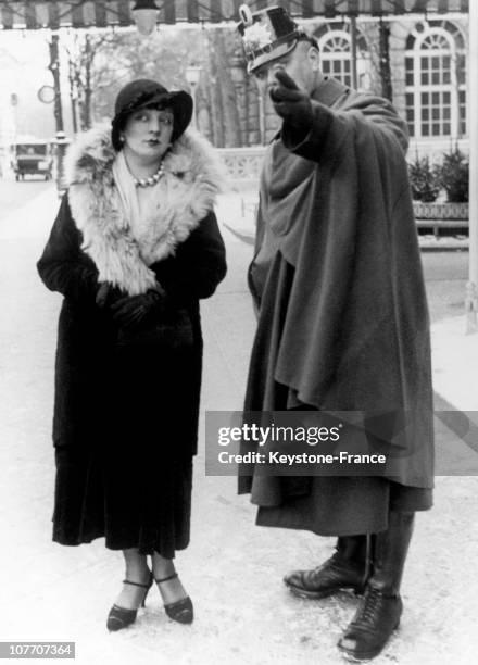 Kiki De Montparnasse Being Shown Her Way By A Policeman In Paris Around 1930.
