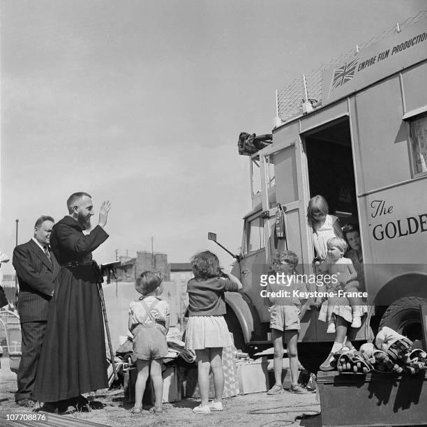 Abbe Pierre Blesses A British Trailer Family Which Going To Make The World Tour On July 25Th 1954.