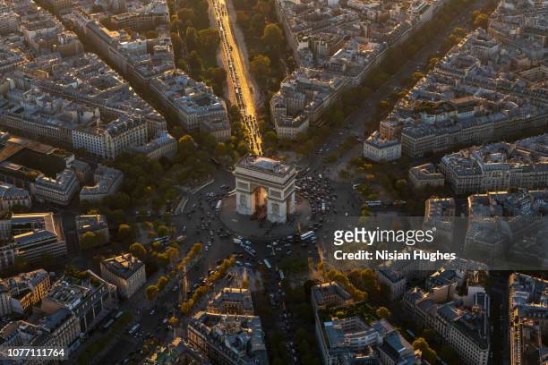 aerial view of arc de triomphe in paris france at sunset - monuments paris ストックフォトと画像