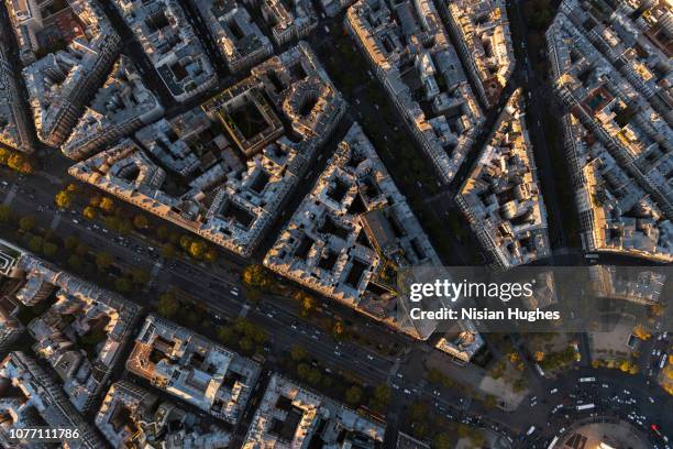 aerial flying over buildings looking directly down, paris france - place charles de gaulle stock pictures, royalty-free photos & images