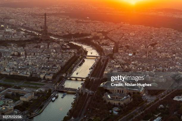 aerial view of paris france with eiffel tower, sunset - aircraft point of view stock pictures, royalty-free photos & images