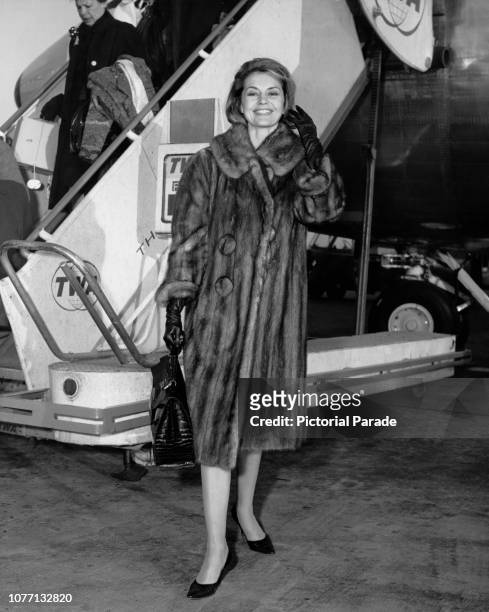 American actress and dancer Cyd Charisse arrives at New York International Airport from Madrid, Spain, where she was working on her latest film 'The...