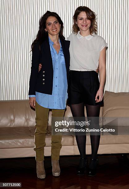 Maya Sansa and Isabella Ragonese attend the "Un Altro Mondo" photocall held at Terrazza Martini on December 21, 2010 in Milan, Italy.