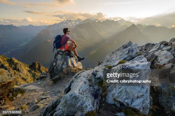 sunset hiking scenery in the mountains - swiss culture imagens e fotografias de stock