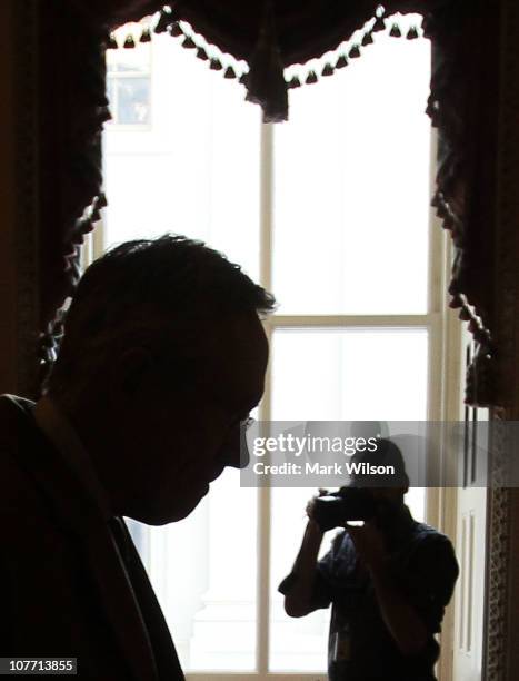 Senate Majority Leader Harry Reid walks towards his office in the U.S. Capitol on December 21, 2010 in Washington, DC. The U.S. Senate is continuing...