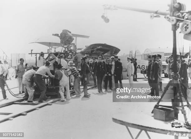 German actor Conrad Veidt as German officer Major Strasser, arriving by air in a Fokker Super Universal in a scene for the Warner Bros film...