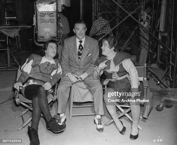 Broadway dancer George Di Verdi visits actors Bud Abbott and Lou Costello on the set of the Exclusive Productions/Warner Bros comedy film 'Jack And...