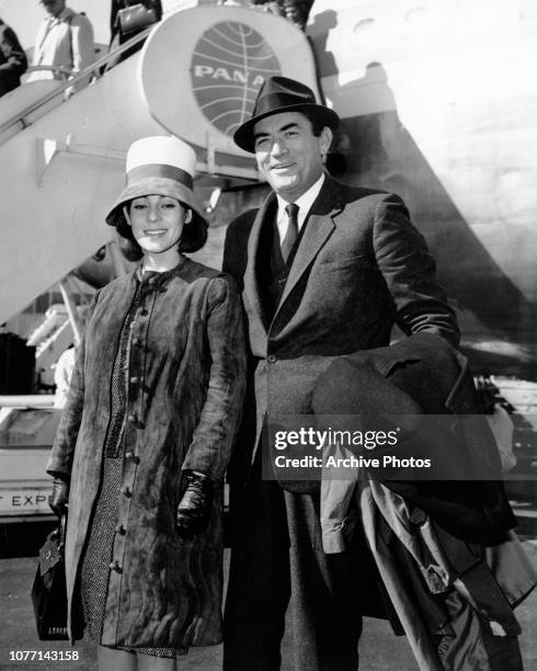 American actor Gregory Peck and his wife Veronique arrive at New York International Airport from the UK, 31st March 1963. They had just watched their...