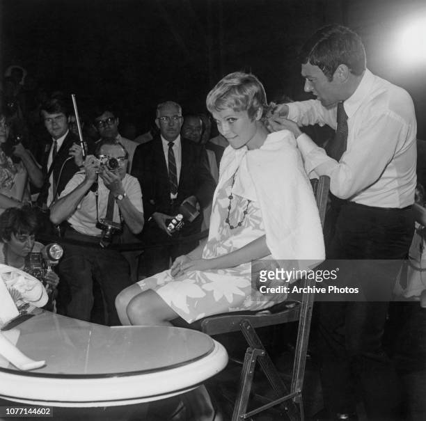 American actress Mia Farrow has her hair cut short by stylist Vidal Sassoon, at Stage 13 of the Paramount Studios in Hollywood, California, 14th...
