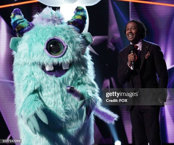 Monster and host Nick Cannon in the "Mask On Face Off" series premiere of THE MASKED SINGER airing Wednesday, Jan 2 on FOX.