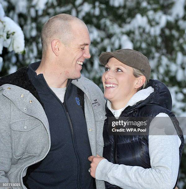 Zara Phillips and her fiance Mike Tindall pose at their Gloucestershire home, after they announced their engagement on December 21, 2010 in...