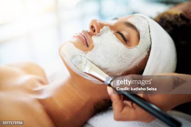 nothing boosts the skin like a facial - exfoliation face stock pictures, royalty-free photos & images
