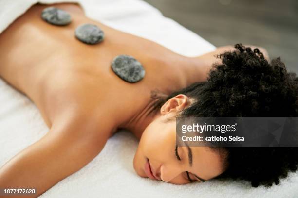 no more muscle tension - massage black woman stock pictures, royalty-free photos & images