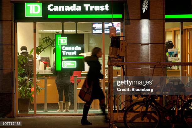 Pedestrian walks past one of Toronto-Dominion Bank's Canada Trust branches in Toronto, Ontario, Canada, on Monday, Dec. 20, 2010. Toronto-Dominion...