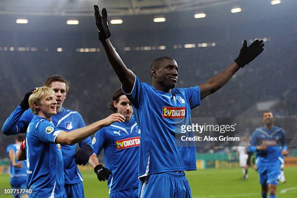 Demba Ba of Hoffenheim celebrates his team's second goal with team mates during the DFB Cup round of sixteen match between 1899 Hoffenheim and...