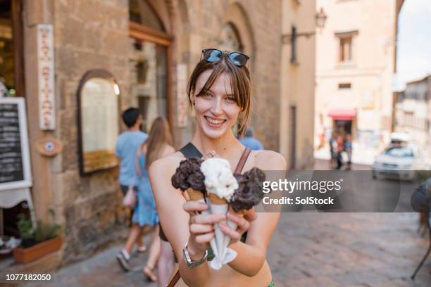 ice-cream break! - handful stock pictures, royalty-free photos & images
