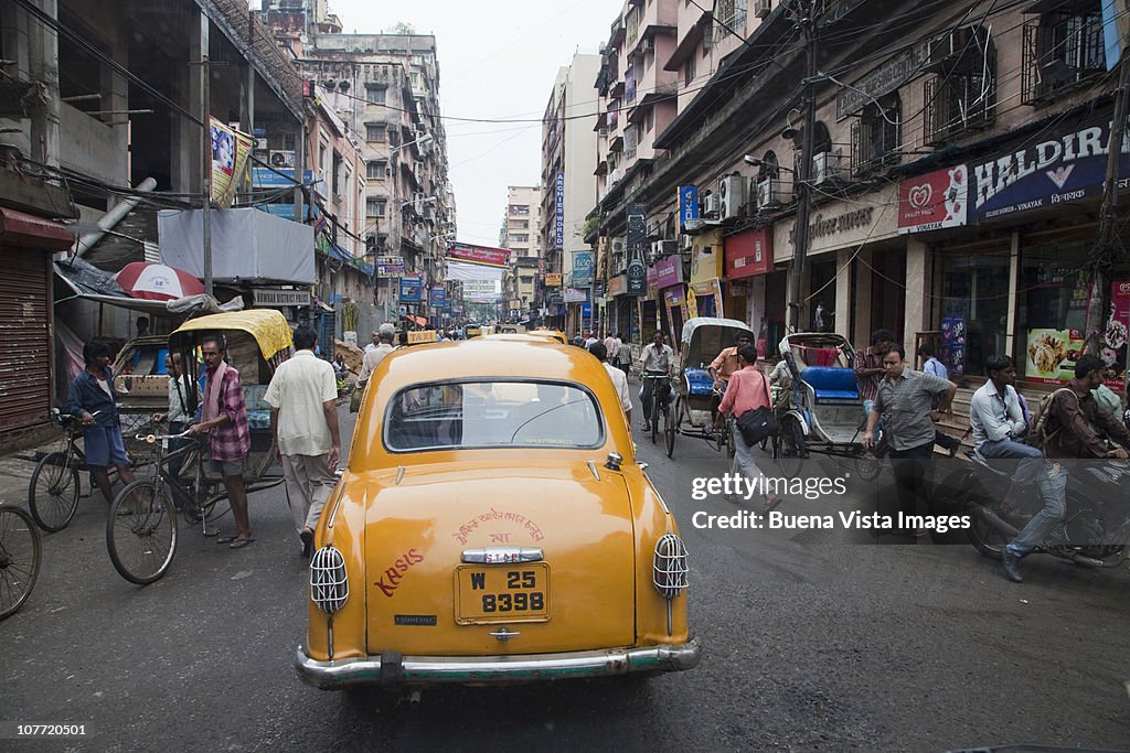 Taxi cab in Kolkakta (Calcutta) on crowded street