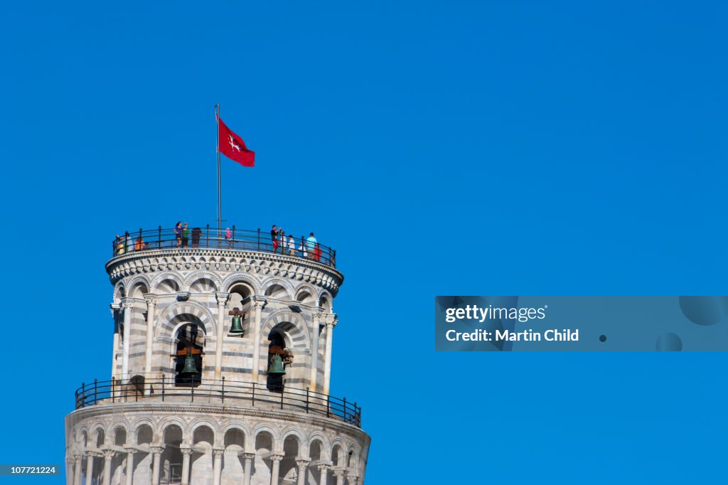 Tourists at the top of the leaning tower of Pisa