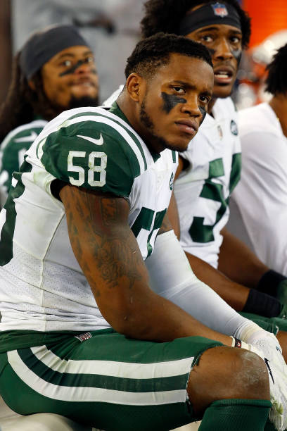 Inside Linebacker Darron Lee of the New York Jets watches from the sideline during a game against the Tennessee Titans at Nissan Stadium on December...